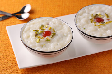 Sabudana Kheer thick pudding with tapioca pearls sago dessert from cassava root Indian sweet mithai  chowari payasam for Mahashivratri Ram Navami Diwali festival.