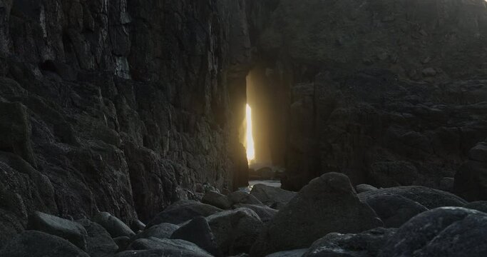 Rocky Coast With Zawn Pyg Rock Arch In Nanjizal Beach, Cornwall, United Kingdom. - static