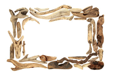 Driftwood rustic abstract natural background border composition on white. Rectangular frame design element, flat lay, top view. Copy space.