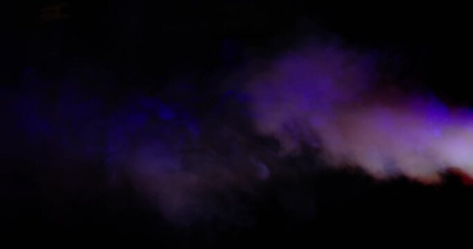 Smoke spray with rgb light on black background.
