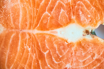 A piece of frozen salmon fillet. Close-up of pink salmon fillet with space to copy. High quality photo