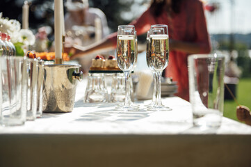 Wine glass background. Alcohol banquet table. Shiny alcohol empty glasses.