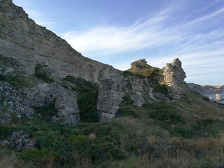 Landslide sea coast. Summer season