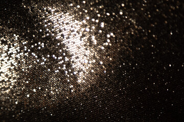 Black metallic background scales with shiny elements. The structure of the armor cell protection. For decor. Copyspace