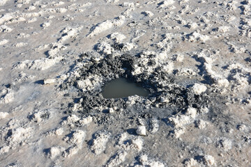 therapeutic mud in dried salt lake, salt lake, bottom of salt lake