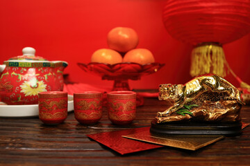 Chinese New Year background , New Year celebrations red envelope, orange , hot tea and tigger symbol