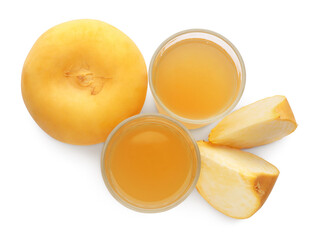 Glasses of freshly made turnip juice on white background, top view