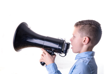 Boy shouting into a large black megaphone from the front with a white background