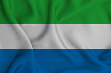 Obraz premium 3D illustration of the flag of Sierra Leone waving in the wind.