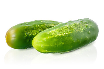 two green ripe cucumbers isolated on white background