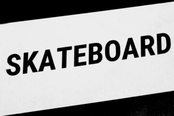 Label stating skateboard - a sports equiment for Skateboarding. It is an action sport which involves riding and performing tricks using a skateboard, as well as a recreational activity.
