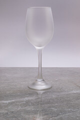 Frosted crystal goblet on gray marble