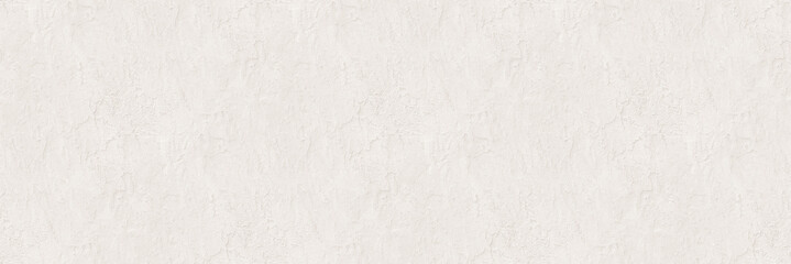 Fototapeta na wymiar Big white wall. Cement rough surface. Irregular pattern in grunge style.
