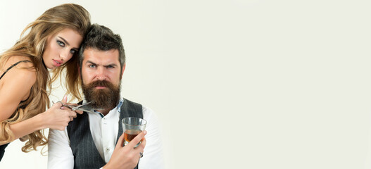 Beard man with classic long beard drink whiskey, bearded man and sexy woman with scissors. Barber with scissor, barbershop. Templates web banner design. Horizontal banner for website header.