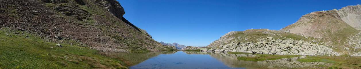 Fototapeta na wymiar Mountain landscape in the Pyrenees. Mountain lake. Spanish Pyrenees.