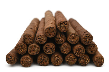 Cigarillos on white background, twisted tobacco leaves