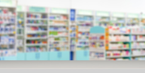 Pharmacy table banner background. Blur counters of pharmacy with medicines, tablets and pills.