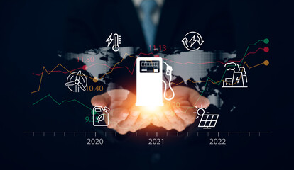 Oil energy graph of the world market, impact on the economy concept,Businessman touch chart with...