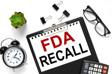 FDA recall text on white paper on folder - obrazy, fototapety, plakaty