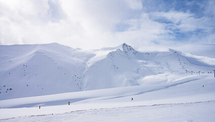 Fototapeta na wymiar Beautiful landscape winter summer day on snowy mountain in ski resort Arkhyz, Caucasus mountains, Russia