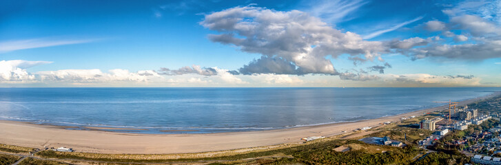 Aerial panorama of The Hague/Kijkduin beach with reflections of the clouds above the North Sea