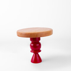 Wooden Cake Stand With Red Base on a White Background