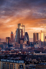 Beautiful sunrise view of the City of London with sunlight reflecting in the glas facade of the modern skyscrapers