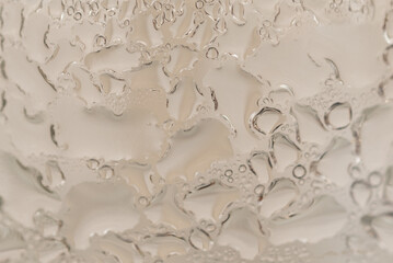 Abstract water surface background. Condense water drops on glass, dripping condensation 