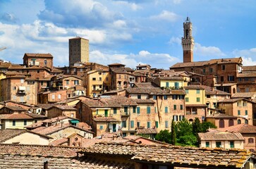 Fototapeta na wymiar The ancient roofs of Siena - Beautiful Ciry in Italy