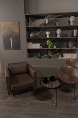 stylish luxury home office interior in an ultramodern brutal apartment in dark colors and cool led lighting