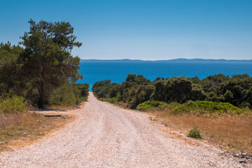 Look on a dusty road to the beach, Nin, Zadar County, Croatia