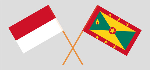 Crossed flags of Indonesia and Grenada. Official colors. Correct proportion