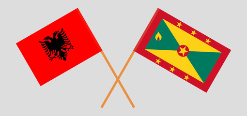 Crossed flags of Albania and Grenada. Official colors. Correct proportion