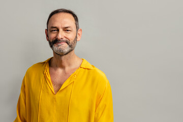 Stylish handsome grey bearded senior on casual clothes