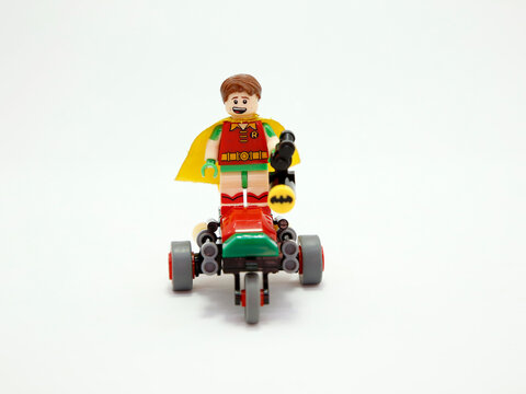 Robin. Wonder boy. Lego toys. Super hero. Superhero. Toys figures. Toys Classic super hero who flies. Marvel. DC comics. Isolated white. Robin on motorcycle. Vehicle.