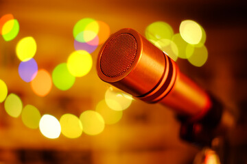 Vintage Microphone On Stage With Bokeh Light, Karoke,Entertainment,Music Concept,Close up Shot with...
