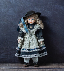Amazing realistic vintage toy with blue eyes.The doll dressed in a white-blue dress with lace and...