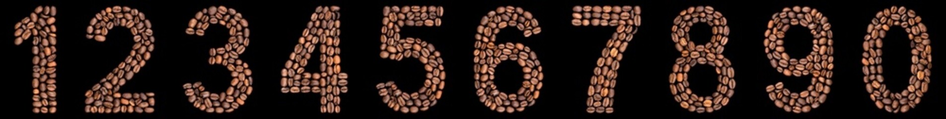 Set of arabic numbers from natural roasted coffee beans, isolated on black background