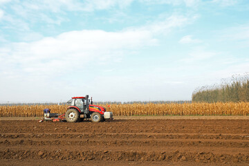 farmers sow winter wheat in fields, North China