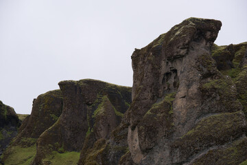 Green Grassy mountain Landscape in the highlands. Travel and nature on a beautiful cold day