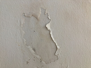 Cracked flaking white paint background texture.
