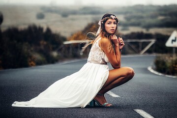woman in a wedding dress in fanal madeira mountains portugal 