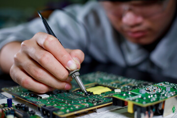 Electronics technician, electronics measuring and testing, repair and maintenance concepts.