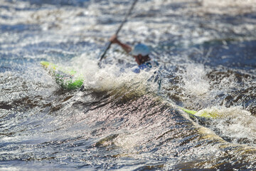 Kayak slalom canoe race in white water rapid river, process of kayaking competition with colorful canoe kayak boat paddling, process of canoeing with big water splash