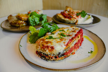 gourmet eggplant parmesan with cheese and tomato sauce