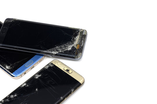 Bangkok, Thailand, 8 January 2022, the smartphone screen is cracked. Prepare to repair on a white background.