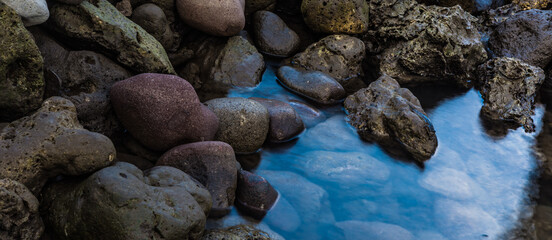 Rocks on a serene blue sea