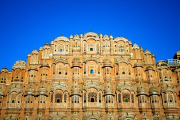 Hawa Mahal, Jaipur. Hawa Mahal, or the Palace of Winds (or Breeze), is a palace at Jaipur in the state of Rajasthan in India. It has 953 small windows.