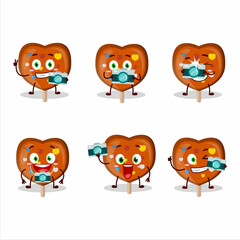 Photographer profession emoticon with orange lolipop love cartoon character