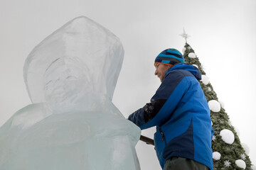 Portrait of a sculptor with a chisel in his hands